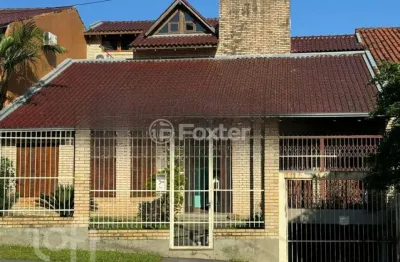 Casa com 3 quartos à venda na rua alcebíades antônio dos santos, 107, nonoai, porto alegre, 423 m2 por r$ 1.100.000