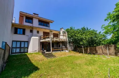Casa com 3 quartos à venda na rua manoel antônio de magalhães, 40, medianeira, porto alegre, 258 m2 por r$ 880.000