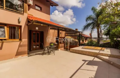 Casa em condomínio fechado com 3 quartos à venda na avenida vicente monteggia, 2000, cavalhada, porto alegre, 260 m2 por r$ 1.080.000