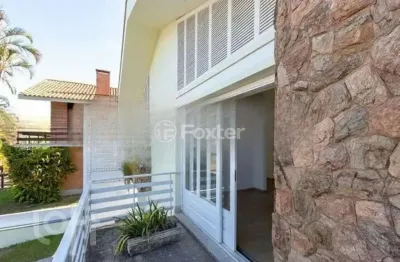 Casa com 3 quartos à venda na Rua Manauê, 76, Vila Assunção, Porto Alegre, 174 m2 por R$ 1.150.000