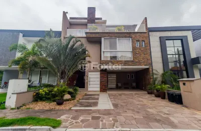 Casa em condomínio fechado com 3 quartos à venda na rua ivo walter kern, 599, hípica, porto alegre, 291 m2 por r$ 1.490.000
