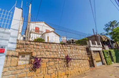 Casa com 3 quartos à venda na avenida nonoai, 1566, nonoai, porto alegre, 319 m2 por r$ 750.000