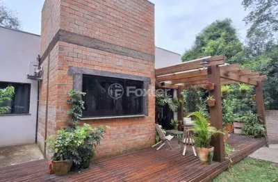 Casa em condomínio fechado com 3 quartos à venda na rua das camélias, 32, são lucas, viamão, 105 m2 por r$ 560.500