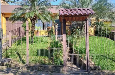 Casa com 3 quartos à venda na rua marquês do maricá, 135, vila nova, porto alegre, 127 m2 por r$ 712.500