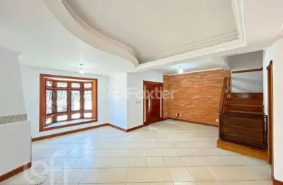 Casa em condomínio fechado com 3 quartos à venda na rua roberto santini, 194, hípica, porto alegre, 138 m2 por r$ 720.000
