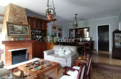 Casa com 3 quartos à venda na rua desembargador joão pereira de sampaio, 15, jardim itu sabará, porto alegre, 226 m2 por r$ 650.000