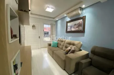 Casa em condomínio fechado com 2 quartos à venda na rua santa eulália, 57, olaria, canoas, 57 m2 por r$ 325.000