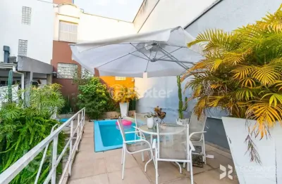 Casa com 3 quartos à venda na rua coronel bordini, 822, auxiliadora, porto alegre, 198 m2 por r$ 1.590.000