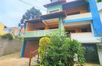 Casa com 3 quartos à venda na rua theonila carvalho da motta, 80, parque santa fé, porto alegre, 438 m2 por r$ 1.150.000