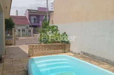 Casa com 4 quartos à venda na rua garibaldi, 143, alvorada, guaíba, 241 m2 por r$ 1.350.000
