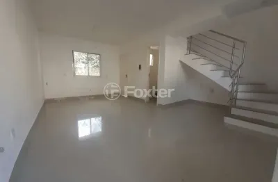 Casa em condomínio fechado com 3 quartos à venda na Beco do Soares, 1116, São Lucas, Viamão, 70 m2 por R$ 212.000
