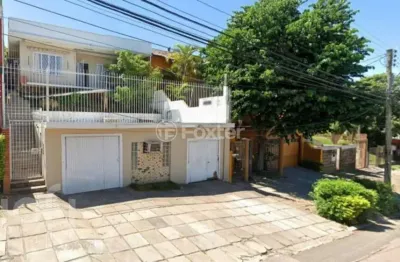 Casa com 3 quartos à venda na rua doutor barbosa gonçalves, 41, chácara das pedras, porto alegre, 141 m2 por r$ 900.000