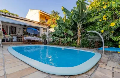 Casa com 3 quartos à venda na rua menezes paredes, 256, nonoai, porto alegre, 131 m2 por r$ 551.000