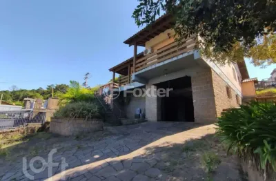 Casa com 3 quartos à venda na avenida vicente monteggia, 2486, cavalhada, porto alegre, 1534 m2 por r$ 1.750.000