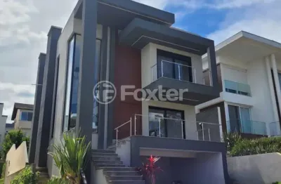 Casa em condomínio fechado com 3 quartos à venda na avenida senador salgado filho, 8500, querência, viamão, 235 m2 por r$ 1.548.500