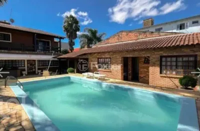 Casa com 4 quartos à venda na rua bernardino de oliveira fonseca, 215, centro, gravataí, 340 m2 por r$ 2.300.000