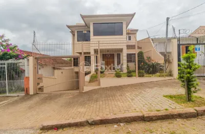Casa com 4 quartos à venda na rua bartolomeu dias, 492, jardim itu sabará, porto alegre, 348 m2 por r$ 1.800.000