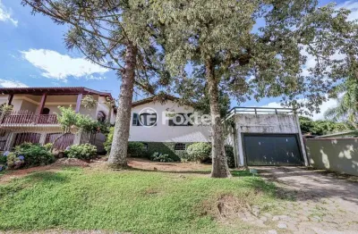 Casa com 3 quartos à venda na Rua Correio Rural, 172, Tarumã, Viamão, 216 m2 por R$ 480.000