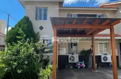 Casa em condomínio fechado com 3 quartos à venda na avenida joão ferreira jardim, 140, parque santa fé, porto alegre, 116 m2 por r$ 375.000