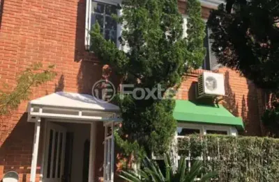 Casa em condomínio fechado com 4 quartos à venda na rua engenheiro ildefonso simões lopes, 114, três figueiras, porto alegre, 197 m2 por r$ 1.348.000