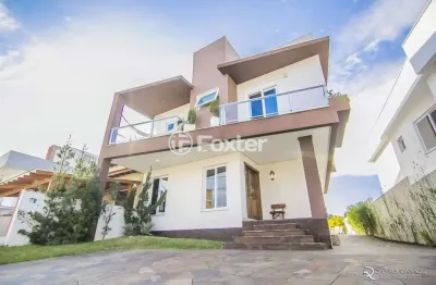 Casa em condomínio fechado com 3 quartos à venda na avenida edgar pires de castro, 540, hípica, porto alegre, 186 m2 por r$ 990.000