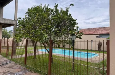 Casa com 4 quartos à venda na rua japeju, 39, arquipélago, porto alegre, 180 m2 por r$ 800.000
