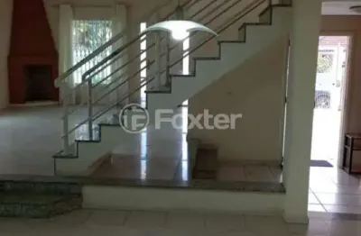 Casa com 4 quartos à venda na rua ipê rosa, 601, carianos, florianópolis, 256 m2 por r$ 1.150.000