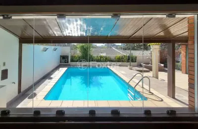 Casa com 4 quartos à venda na rua carlos huber, 826, três figueiras, porto alegre, 318 m2 por r$ 1.616.000