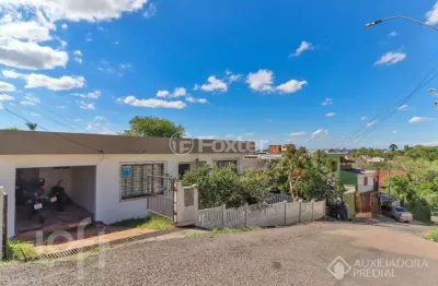 Casa com 3 quartos à venda na Rua Diamantina de Bittencourt Oliveira, 10, Nonoai, Porto Alegre, 146 m2 por R$ 338.000