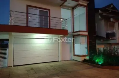 Casa em condomínio fechado com 4 quartos à venda na rua antônio ramos, 40, loteamento jardim timbaúva, gravataí, 268 m2 por r$ 890.000