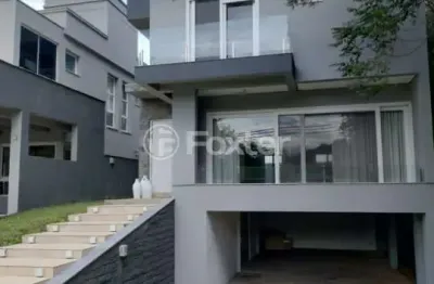 Casa em condomínio fechado com 3 quartos à venda na avenida senador salgado filho, 8500, querência, viamão, 271 m2 por r$ 1.300.000
