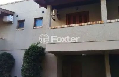 Casa em condomínio fechado com 2 quartos à venda na avenida guarujá, 126, guarujá, porto alegre, 102 m2 por r$ 430.000
