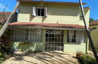 Casa com 3 quartos à venda na rua ibirubá, 94, cavalhada, porto alegre, 277 m2 por r$ 799.999
