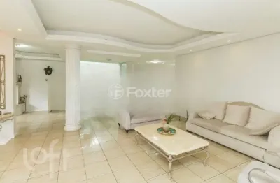 Casa com 5 quartos à venda na rua theonila carvalho da motta, 184, parque santa fé, porto alegre, 650 m2 por r$ 1.250.000