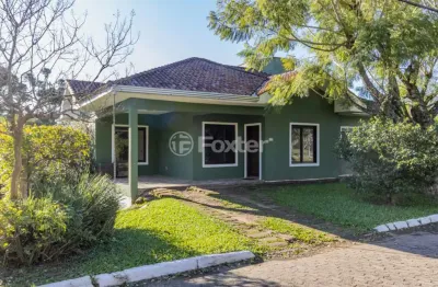 Casa em condomínio fechado com 3 quartos à venda na estrada capitão gentil machado de godoy, 4500, vila elsa, viamão, 128 m2 por r$ 850.000