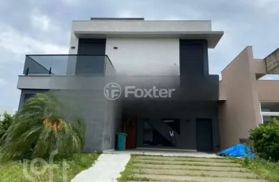 Casa em condomínio fechado com 4 quartos à venda na estrada estrada do mar, 32, praia do barco, capão da canoa, 310 m2 por r$ 2.850.000