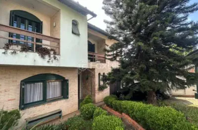 Casa com 5 quartos à venda na rua doutor osvaldo degrazia, 270, parque santa fé, porto alegre, 115 m2 por r$ 980.000