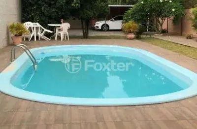 Casa com 3 quartos à venda na rua tamoio, 3091, niterói, canoas, 106 m2 por r$ 695.000