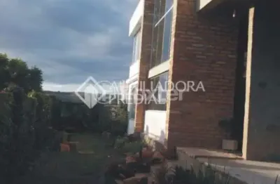 Casa com 3 quartos à venda na rua amapá, 1600, vila nova, porto alegre, 312 m2 por r$ 950.000