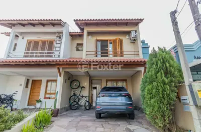 Casa em condomínio fechado com 3 quartos à venda na rua guatambu, 37, hípica, porto alegre, 108 m2 por r$ 580.000