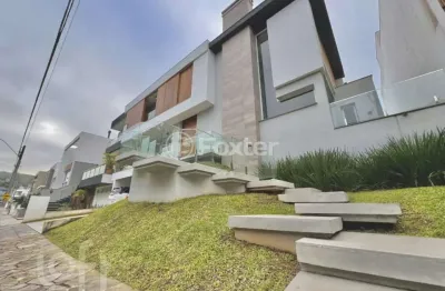 Casa em condomínio fechado com 4 quartos à venda na avenida edgar pires de castro, 1780, hípica, porto alegre, 488 m2 por r$ 3.180.000