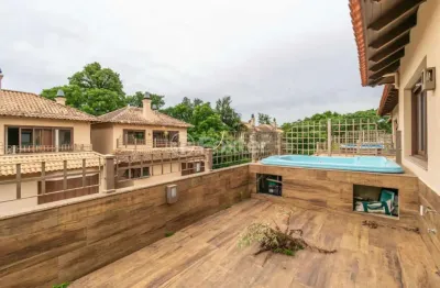 Casa em condomínio fechado com 3 quartos à venda na avenida otto niemeyer, 77, tristeza, porto alegre, 299 m2 por r$ 1.750.000