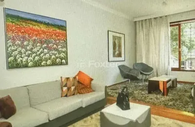 Casa com 3 quartos à venda na rua eudoro berlink, 333, auxiliadora, porto alegre, 240 m2 por r$ 3.500.000