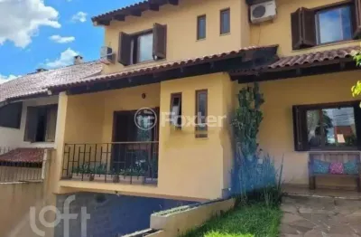 Casa com 3 quartos à venda na Rua Doutor Mário Totta, 2812, Tristeza, Porto Alegre, 286 m2 por R$ 870.000