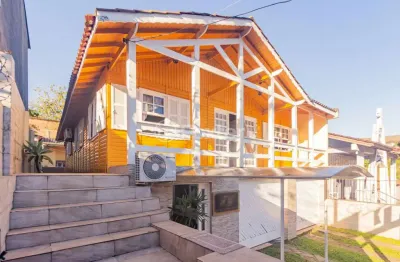 Casa com 3 quartos à venda na rua cachoeira, 54, nonoai, porto alegre, 387 m2 por r$ 450.000