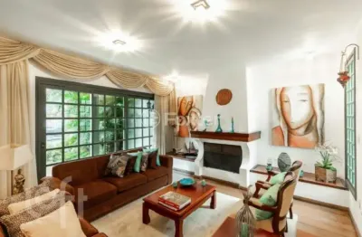 Casa com 3 quartos à venda na rua eudoro berlink, 987, auxiliadora, porto alegre, 239 m2 por r$ 1.990.000