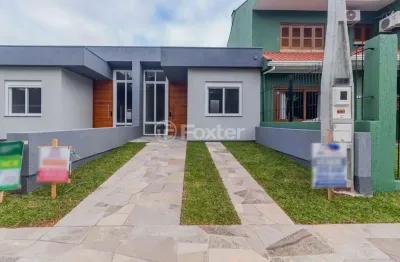 Casa em condomínio fechado com 2 quartos à venda na rua fernando jorge schneider, 937, hípica, porto alegre, 65 m2 por r$ 483.000