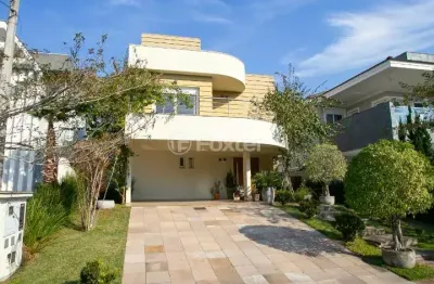 Casa em condomínio fechado com 3 quartos à venda na rua itacolomi, 1710, santa cruz, gravataí, 250 m2 por r$ 1.750.000