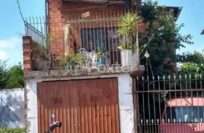 Casa com 2 quartos à venda na rua estácio azambuja, 237, monte belo, gravataí, 88 m2 por r$ 270.000