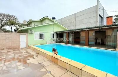 Casa com 4 quartos à venda na rua professor guerreiro lima, 185, partenon, porto alegre, 200 m2 por r$ 1.390.000